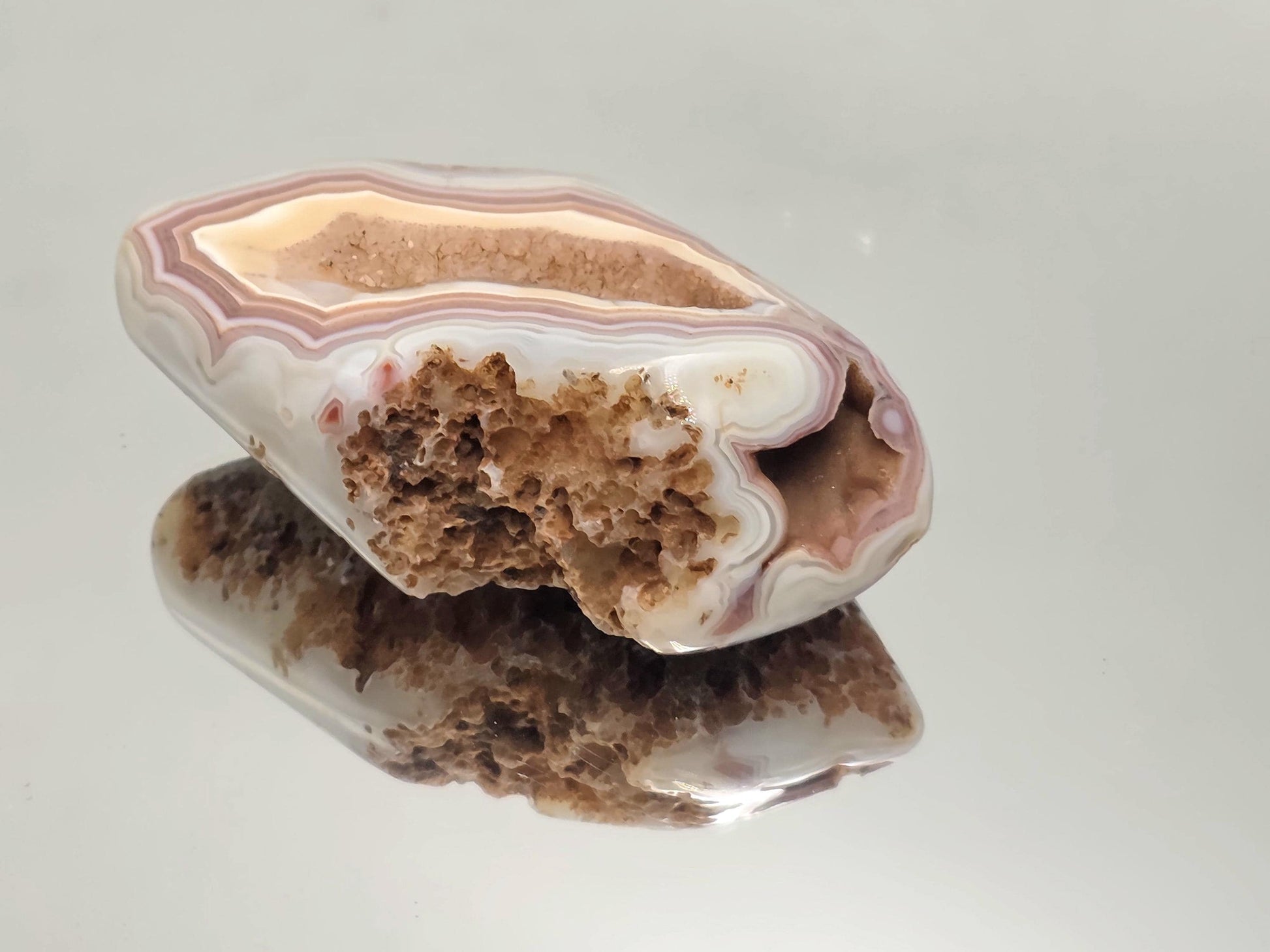 Unique banded Malawi Agate polished geode.