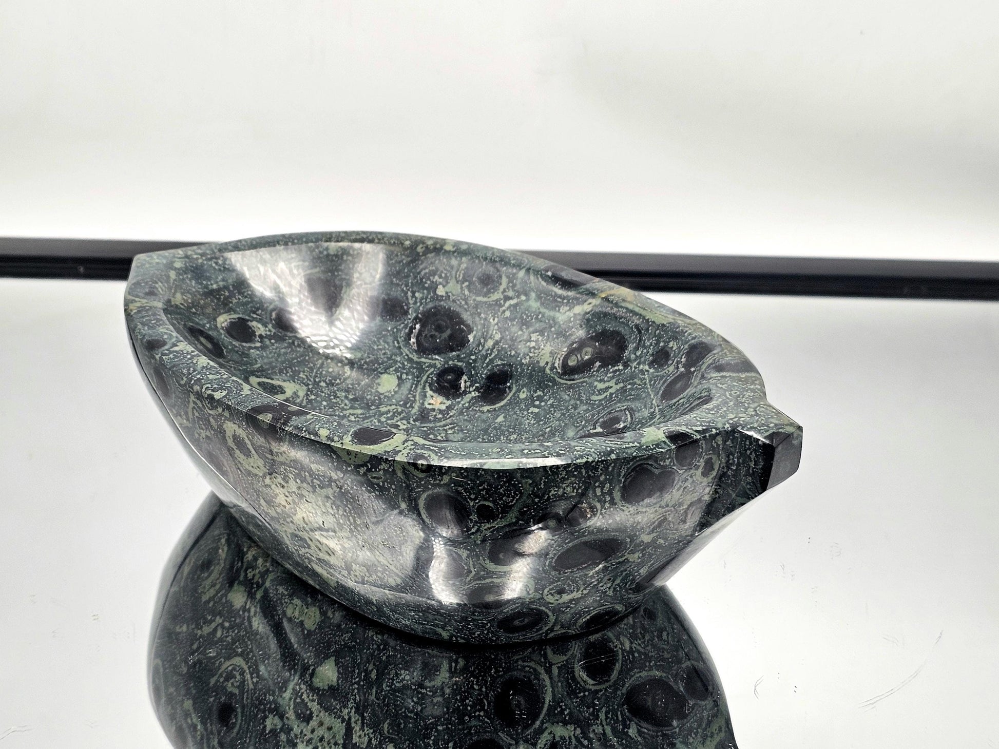 Unique Kambaba Jasper leaf-shaped bowl for crystal collectors.