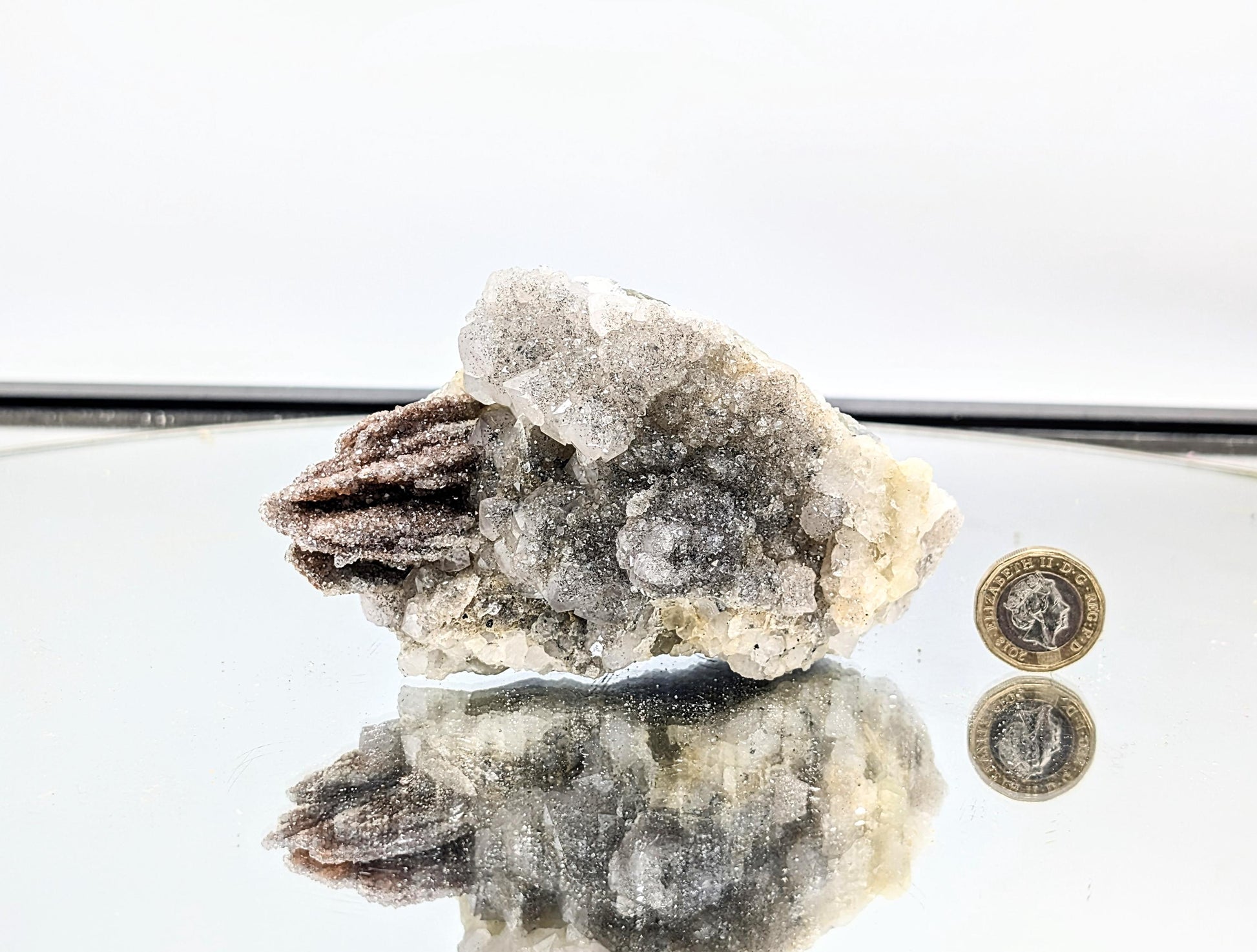 Unique Quartz on Fluorite crystal, ideal for mineral enthusiasts.