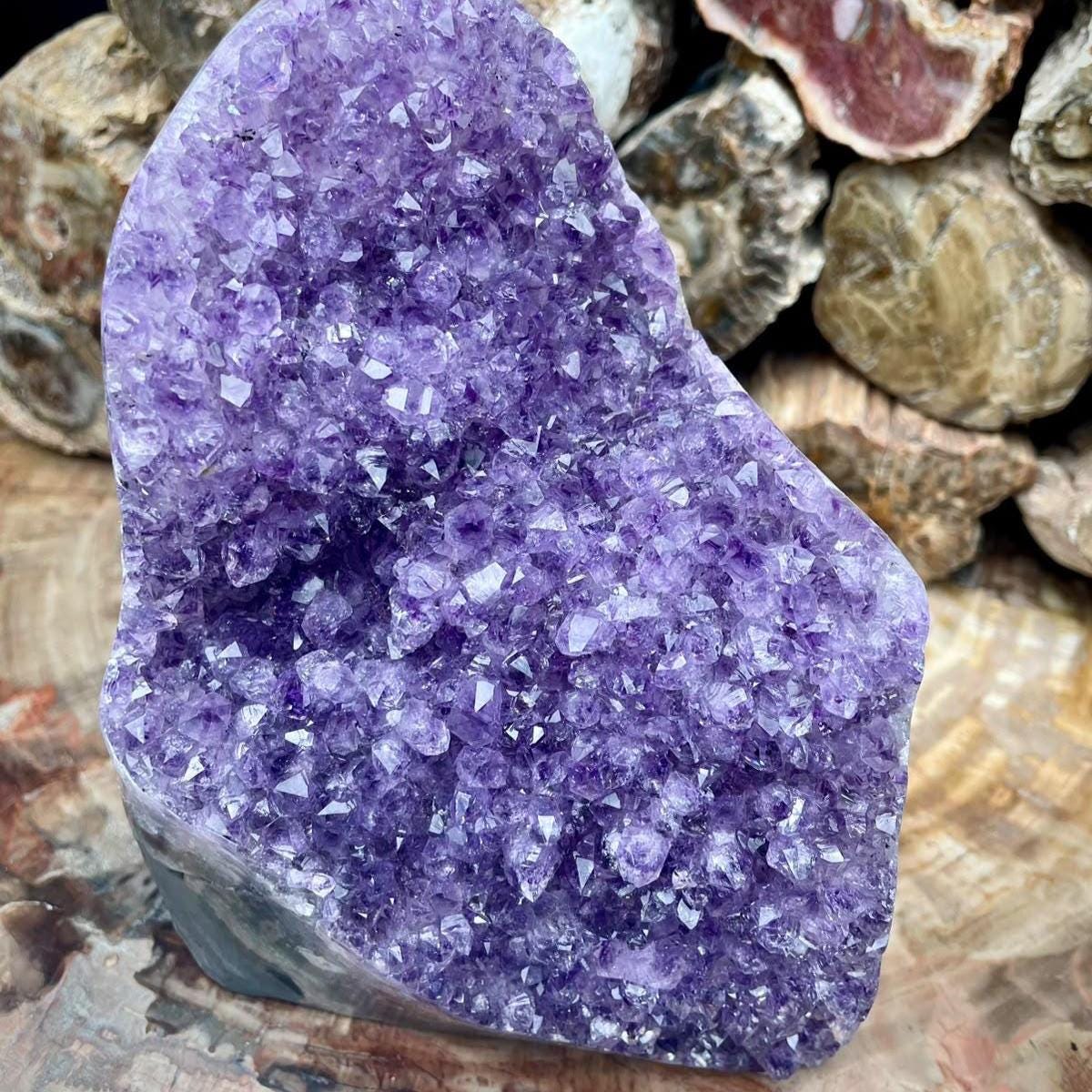 Natural Uruguay Amethyst crystal geode freestanding cut base