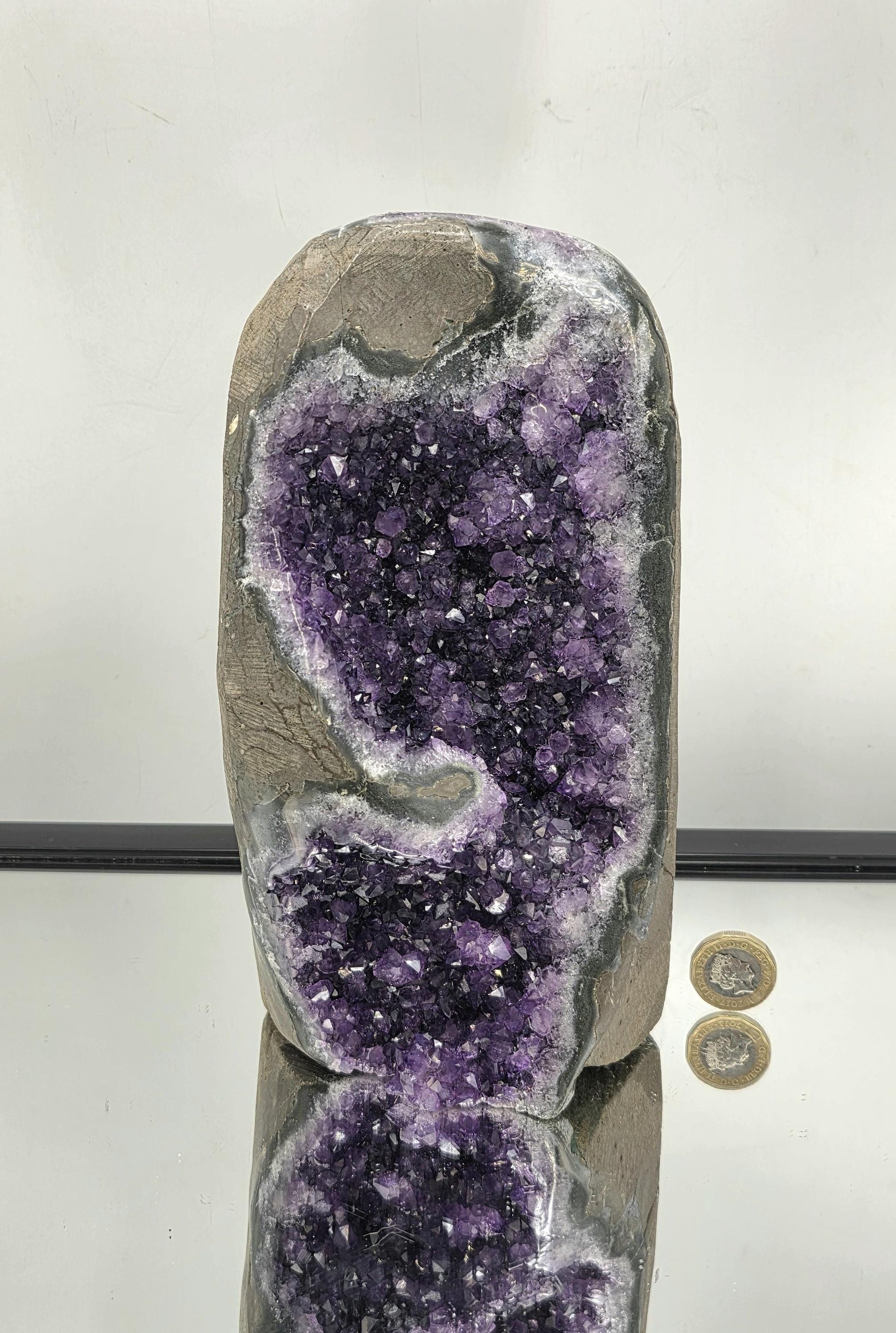 Natural Amethyst geode with polished base from Uruguay