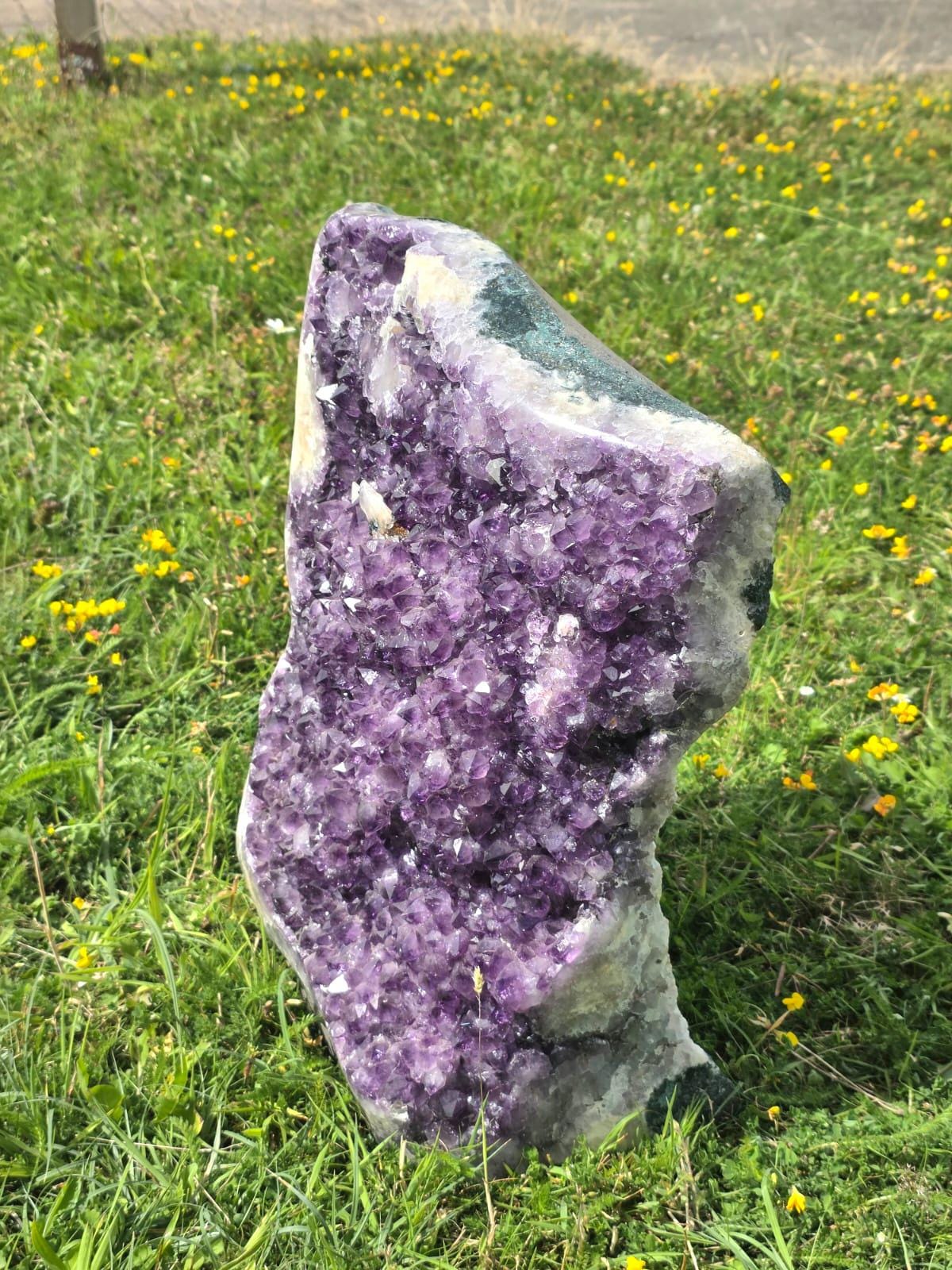 Natural Uruguayan Amethyst crystal specimen with rich purple crystal points and basalt matrix