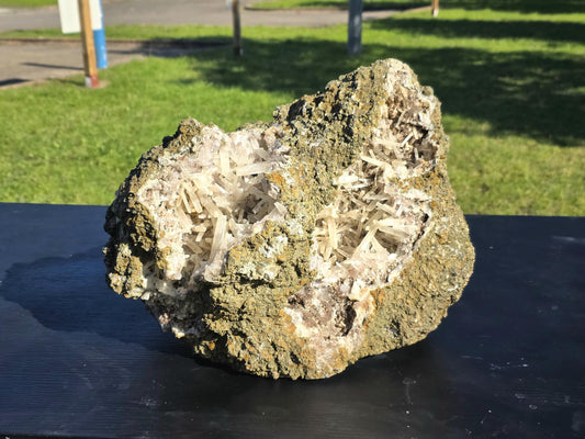 Very large Moroccan Aragonite geode showcasing striking natural crystal formations.