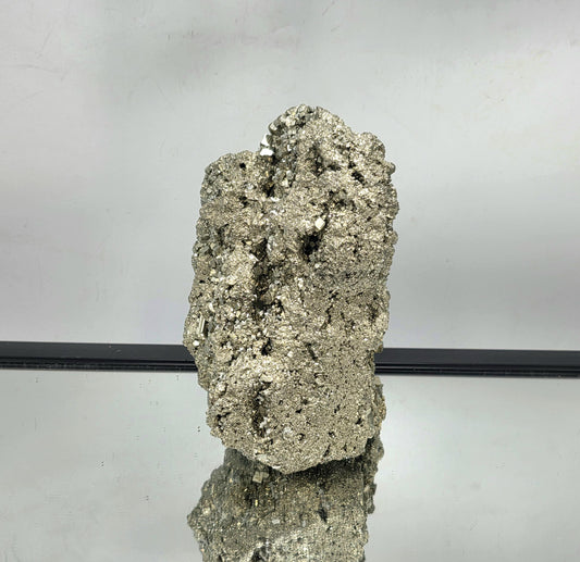 Very large Pyrite crystal cluster with metallic shine.