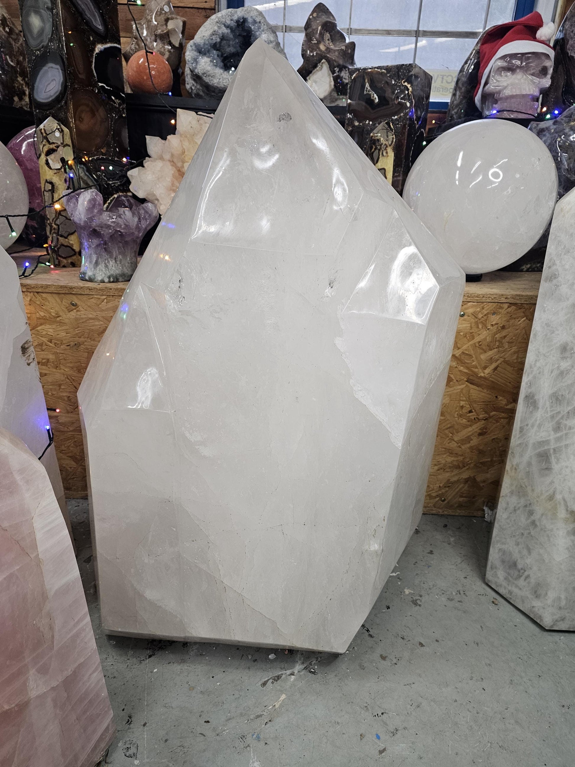 Huge Madagascar quartz crystal point with clear top and polished finish – rare collector specimen