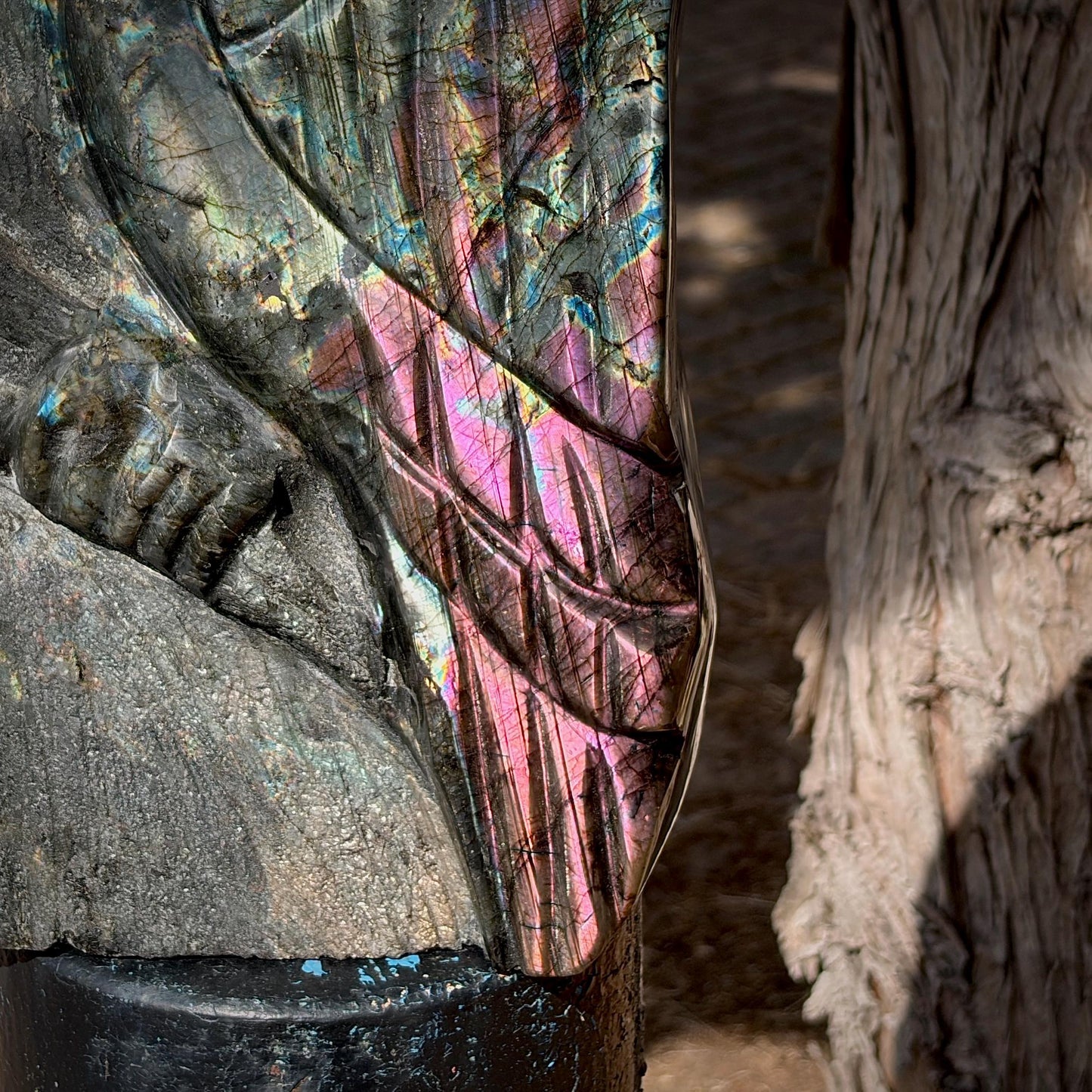Angled view of the 8.3kg Labradorite parrot statement sculpture highlighting its exceptional craftsmanship.
