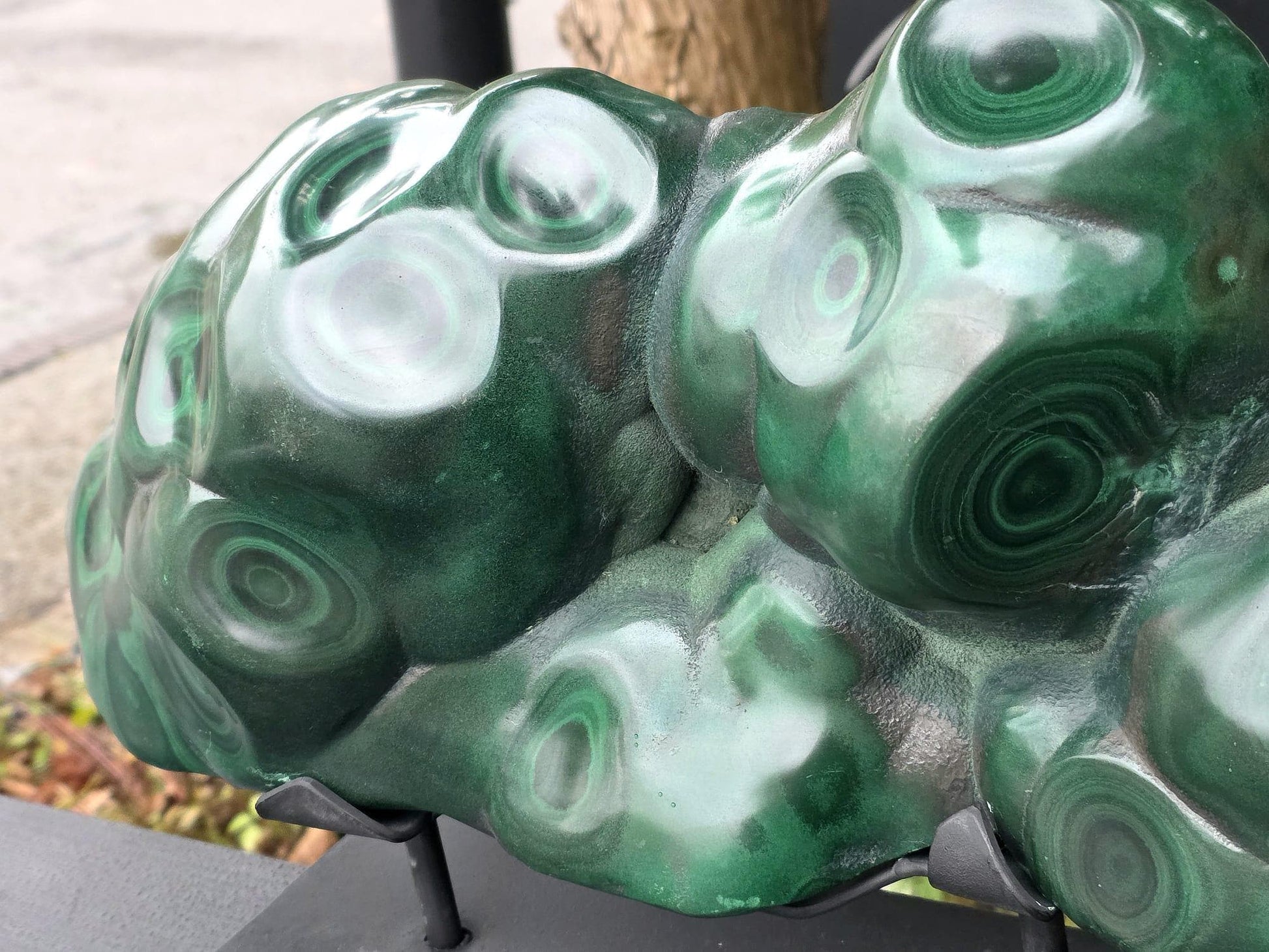 XL polished Malachite statement piece on stand for high-end homes