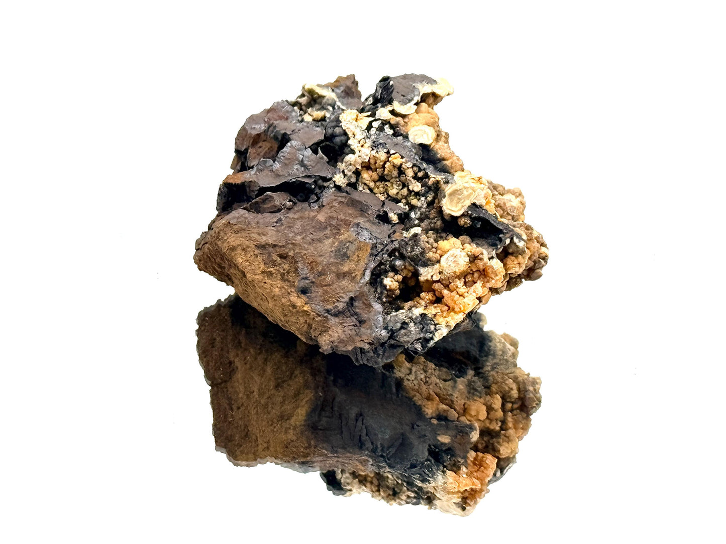 Natural mimetite crystals growing on mineral matrix