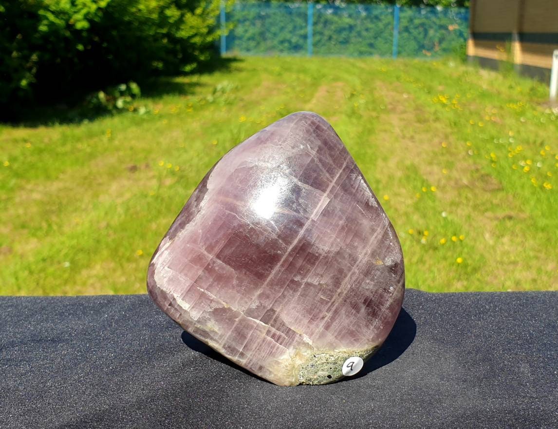A beautiful large freestanding Anhydrite crystal.  Handcrafted and polished by artisans in Madagascar.