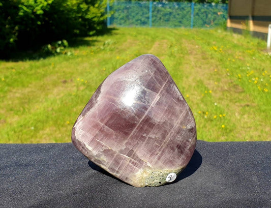 A beautiful large freestanding Anhydrite crystal.  Handcrafted and polished by artisans in Madagascar.