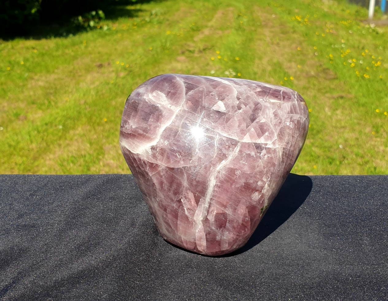 A beautiful large freestanding Anhydrite crystal.  Handcrafted and polished by artisans in Madagascar.