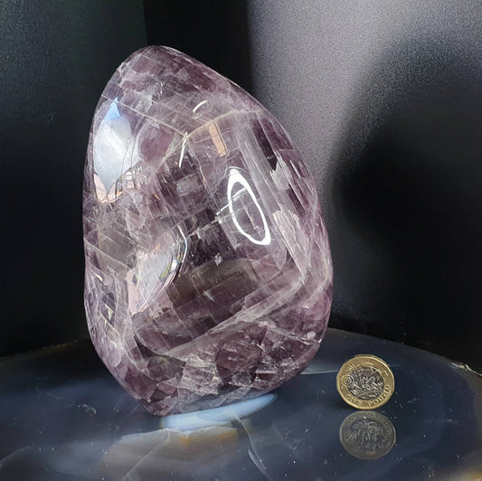 A beautiful large freestanding Anhydrite crystal.  Handcrafted and polished by artisans in Madagascar.