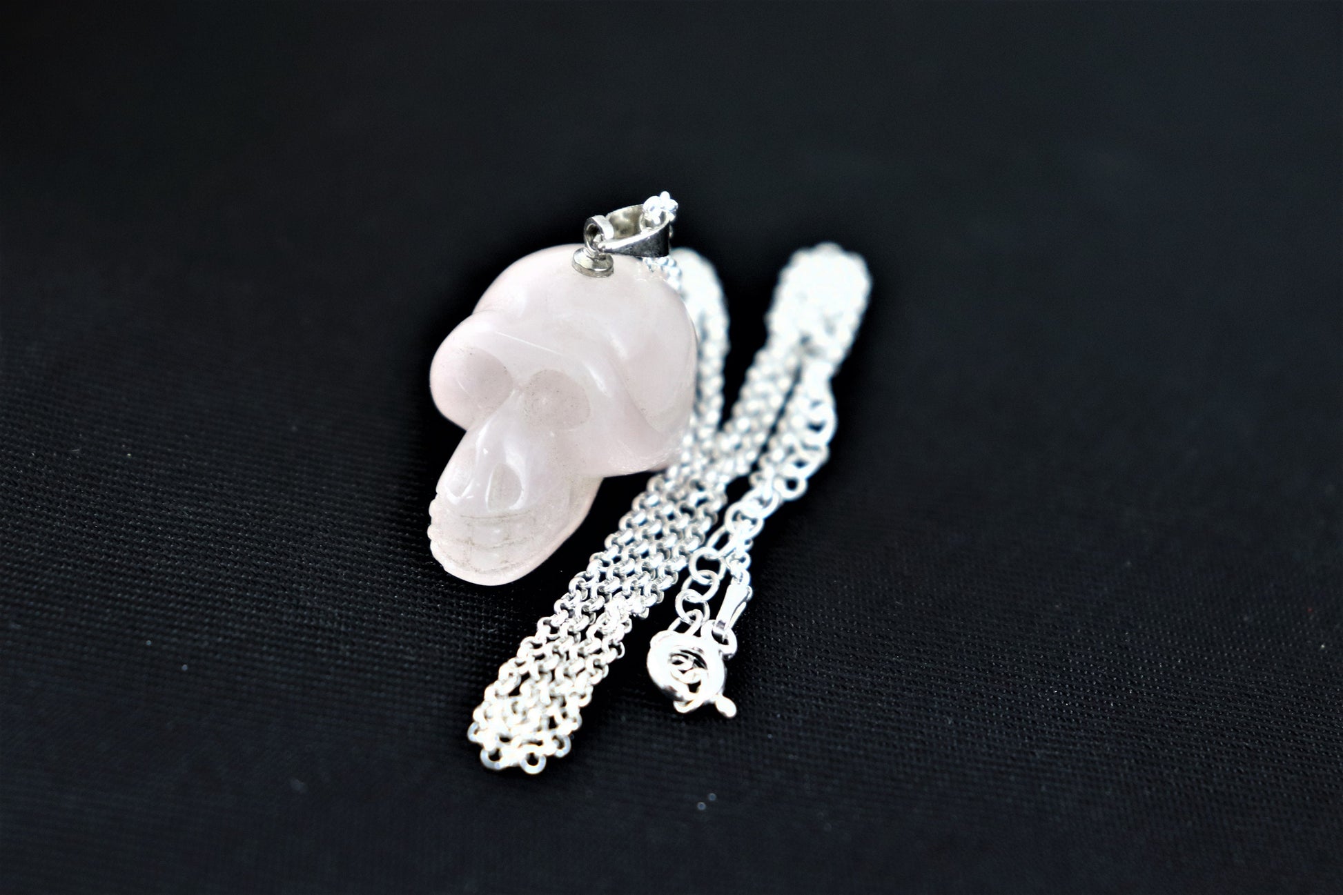 rose quartz crystal skull necklace,