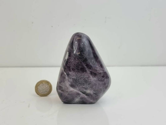 A beautiful large freestanding Anhydrite crystal.  Handcrafted and polished by artisans in Madagascar.