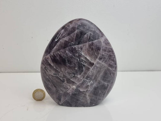 A beautiful large freestanding Anhydrite crystal.  Handcrafted and polished by artisans in Madagascar.