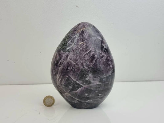 A beautiful large freestanding Anhydrite crystal.  Handcrafted and polished by artisans in Madagascar.