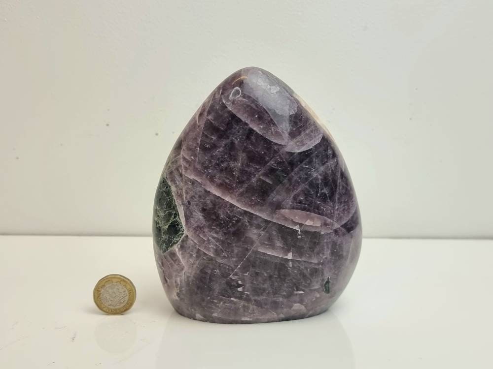 A beautiful large freestanding Anhydrite crystal.  Handcrafted and polished by artisans in Madagascar.