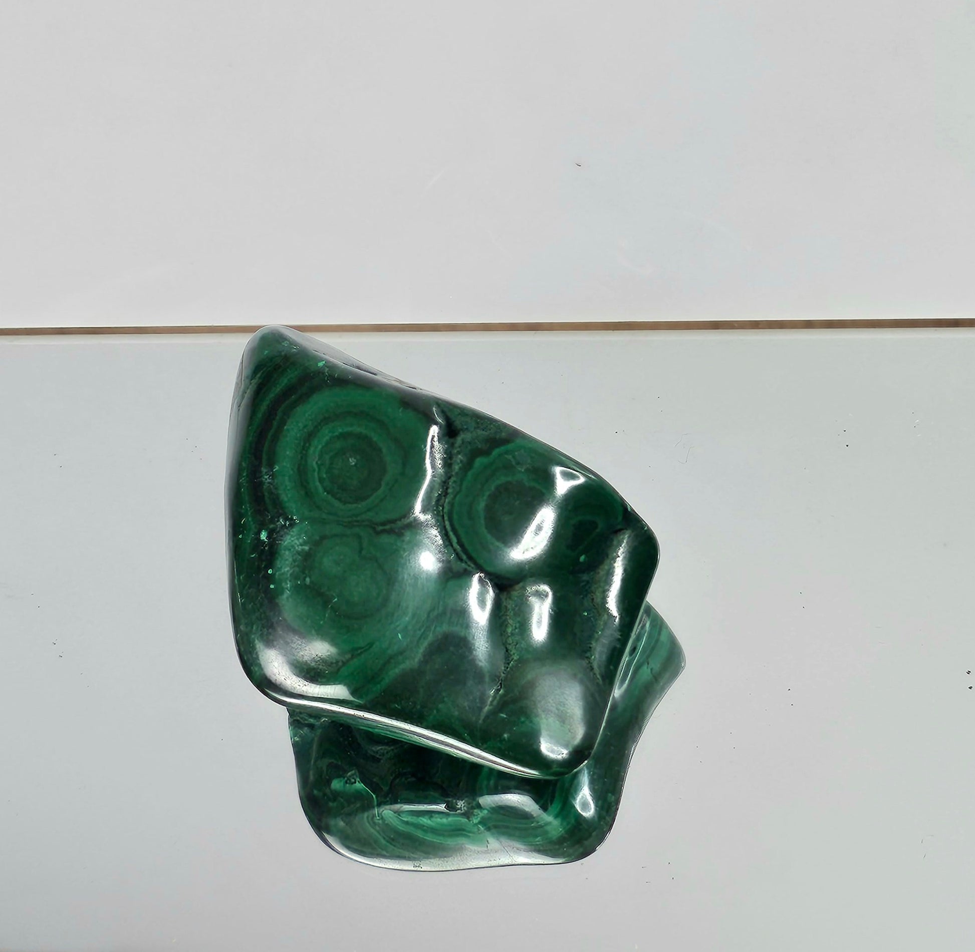Polished malachite crystal