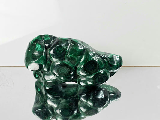 large polished malachite crystal