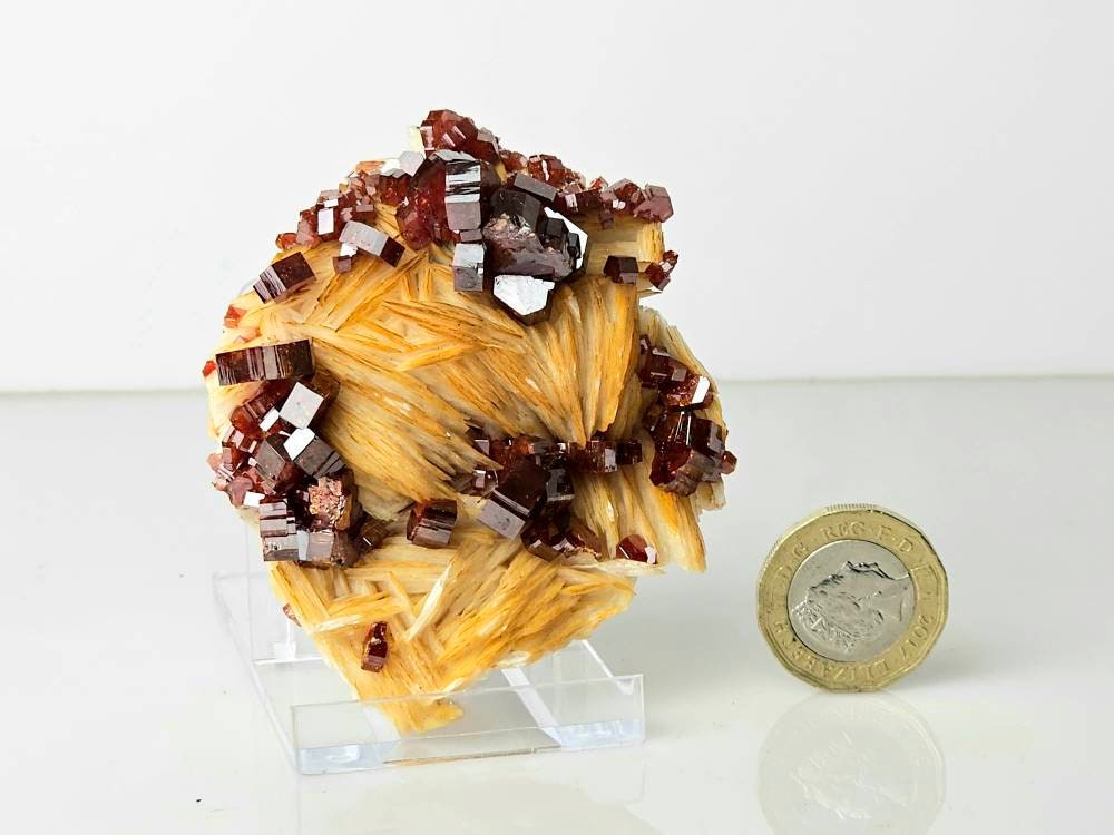burnt orange vanadinite crystal on baryte